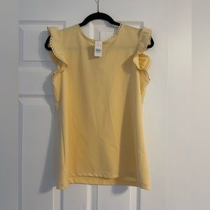 Light Yellow blouse.